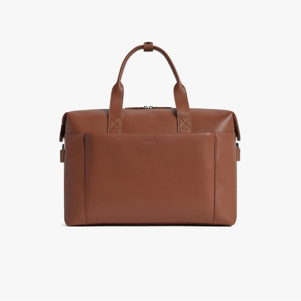 NWOT Monos Metro Duffel in color Mahogany